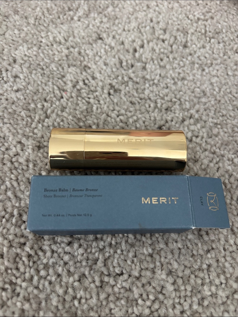 Merit Bronze Balm in colour Clay